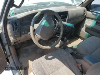 1993 Toyota Pickup DLX z VIN 4TAVN13D3PZ113874, wystawiony jako Copart lot #65384333 z przebiegiem 225 463 mil mil oraz Szkoda całkowita • Salvage title. Historia ofert i sprzedaży dostępna na DreamBid. Obrazek 8.