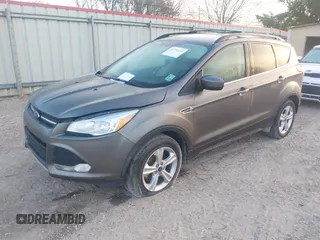 2014 Ford Escape SE with VIN 1FMCU0G91EUB05180, listed as a IAAI auction lot 41758185 with 186,042 mi miles. Bid and sale history available at carsss.com. Image 2.
