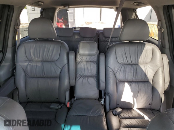 2010 Honda Odyssey EX-L z VIN 5FNRL3H75AB067634, wystawiony jako Copart lot #51538755 z przebiegiem 150 261 mil mil oraz Szkoda całkowita • Salvage title. Historia ofert i sprzedaży dostępna na DreamBid. Obrazek 10.