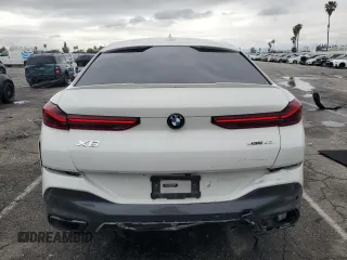 2022 BMW X6 xDrive40i z VIN 5UXCY6C08N9J21980, wystawiony jako Copart lot #48819745 z przebiegiem 24 431 mil mil oraz Szkoda całkowita • Salvage title. Historia ofert i sprzedaży dostępna na DreamBid. Obrazek 6.