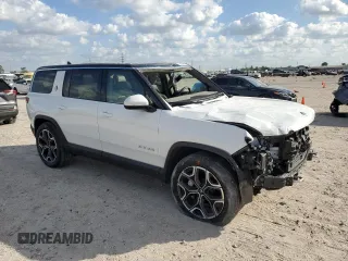 2023 Rivian R1S Adventure with VIN 7PDSGBBA3PN017791, listed as a Copart auction lot 82397374 with 20,733 mi miles and Salvage Title. Bid and sale history available at carsss.com. Image 4.