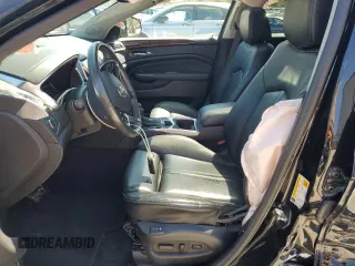 2014 Cadillac SRX Luxury Collection z VIN 3GYFNEE32ES647165, wystawiony jako Copart lot #52331335 z przebiegiem 27 277 mil mil oraz Szkoda całkowita • Salvage title. Historia ofert i sprzedaży dostępna na DreamBid. Obrazek 7.