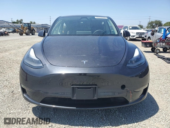 2024 Tesla Model Y с VIN 7SAYGDEDXRF095167, выставлен на аукционе Copart как лот 61676245 с пробегом 12 988 миль миль и Списание • Salvage title. История ставок и продаж доступна на DreamBid. Изображение 5.
