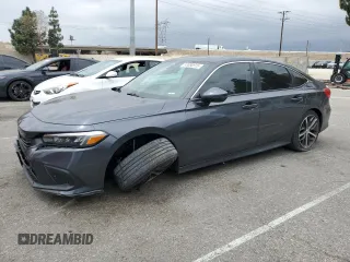 2022 Honda Civic Touring z VIN 2HGFE1F93NH314236, wystawiony jako Copart lot #53380915 z przebiegiem 25 302 mil mil oraz Szkoda całkowita • Salvage title. Historia ofert i sprzedaży dostępna na DreamBid. Obrazek 1.
