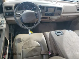 1999 Ford Super Duty F-250 XL with VIN 1FTNW21F1XEE68447, listed as a Copart auction lot 43470365 with 239,074 mi miles and Salvage Title. Bid and sale history available at carsss.com. Image 8.