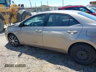2015 Toyota Corolla L with VIN 5YFBURHE1FP312604, listed as a IAAI auction lot 42085424 with 123,379 mi miles and . Bid and sale history available at DreamBid. Image 14.