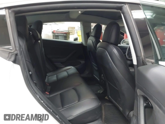 2020 Tesla Model 3 Standard Range Plus with VIN 5YJ3E1EA7LF805828, listed as a IAAI auction lot 41841505 with 44,946 mi miles and . Bid and sale history available at DreamBid. Image 8.