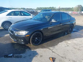 2013 BMW 3 Series 328i with VIN WBA3C1C50DF435473, listed as a IAAI auction lot 41981570 with 135,227 mi miles. Bid and sale history available at carsss.com. Image 2.