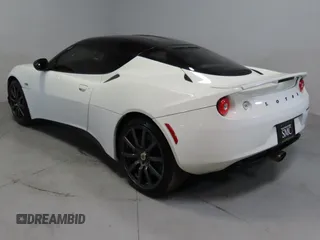2014 Lotus Evora 2+2 z VIN SCCLMDTU5EHA10041, wystawiony jako Copart lot #50226365 z przebiegiem 26 179 mil mil oraz Szkody całkowita. Historia ofert i sprzedaży dostępna na DreamBid. Obrazek 4.