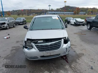 2005 Chrysler Town & Country LX with VIN 2C4GP44R95R307156, listed as a IAAI auction lot 40843940 with Not Provided miles and . Bid and sale history available at DreamBid. Image 12.
