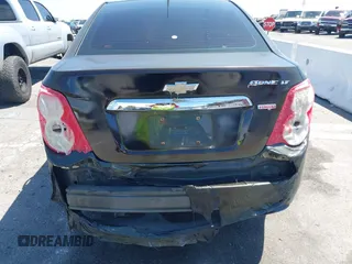 2014 Chevrolet Sonic LT with VIN 1G1JC5SB7E4146444, listed as a IAAI auction lot 42014386 with 85,122 mi miles and . Bid and sale history available at DreamBid. Image 6.