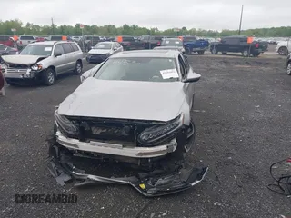 2019 Honda Accord Touring z VIN 1HGCV2F96KA009445, wystawiony jako IAAI lot #42181051 z przebiegiem Nie podano mil oraz . Historia ofert i sprzedaży dostępna na DreamBid. Obrazek 12.