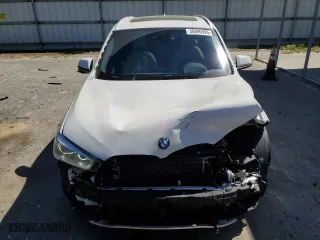 2018 BMW X1 sDrive28i with VIN WBXHU7C31J5L06010, listed as a Copart auction lot 50690995 with 44,092 mi miles and Salvage Title. Bid and sale history available at carsss.com. Image 5.