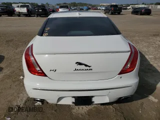 2015 Jaguar XJ with VIN SAJWA1CZ9F8V88418, listed as a Copart auction lot 45547965 with 82,423 mi miles and Salvage Title. Bid and sale history available at carsss.com. Image 6.