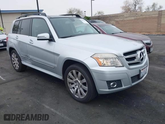 2012 Mercedes-Benz GLK GLK 350 with VIN WDCGG5GB0CF892387, listed as a IAAI auction lot 42031687 with 123,587 mi miles. Bid and sale history available at carsss.com. Image 1.
