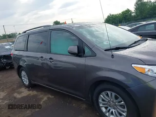2014 Toyota Sienna XLE with VIN 5TDYK3DC0ES496716, listed as a IAAI auction lot 42494549 with 158,645 mi miles and . Bid and sale history available at DreamBid. Image 13.