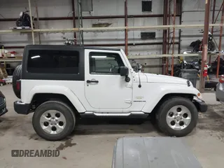 2014 Jeep Wrangler Sahara with VIN 1C4AJWBG7EL234625, listed as a IAAI auction lot 41726770 with 128,080 mi miles and . Bid and sale history available at DreamBid. Image 13.