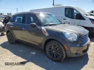 2014 MINI Countryman with VIN WMWZB3C54EWR39731, listed as a Copart auction lot 63635215 with 85,751 mi miles and Salvage title. Bid and sale history available at DreamBid. Image 4.