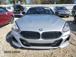 2022 BMW Z4 sDrive30i with VIN WBAHF3C03NWX80169, listed as a Copart auction lot 74791084 with 0 mi miles and Salvage Title. Bid and sale history available at carsss.com. Image 5.