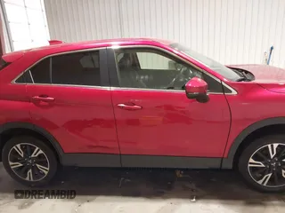 2024 Mitsubishi Eclipse Cross SE z VIN JA4ATWAAXRZ037663, wystawiony jako IAAI lot #41315137 z przebiegiem 23 678 mil mil oraz . Historia ofert i sprzedaży dostępna na DreamBid. Obrazek 14.