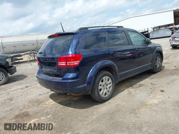 2018 Dodge Journey SE with VIN 3C4PDCAB7JT519491, listed as a IAAI auction lot 41974735 with 135,072 mi miles and . Bid and sale history available at DreamBid. Image 4.