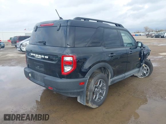 2021 Ford Bronco Sport Badlands z VIN 3FMCR9D96MRA42819, wystawiony jako IAAI lot #41000673 z przebiegiem 58 831 mil mil oraz . Historia ofert i sprzedaży dostępna na DreamBid. Obrazek 4.