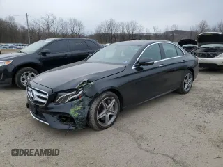 2019 Mercedes-Benz E 300 with VIN WDDZF4KBXKA673571, listed as a Copart auction lot 52425625 with 32,605 mi miles and Salvage title. Bid and sale history available at DreamBid. Image 1.