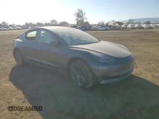 2022 Tesla Model 3 z VIN 5YJ3E1EA2NF336165, wystawiony jako Copart lot #80166114 z przebiegiem 23 097 mil mil oraz Szkoda całkowita • Salvage title. Historia ofert i sprzedaży dostępna na DreamBid. Obrazek 11.