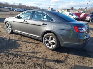 2015 Ford Taurus SEL with VIN 1FAHP2H86FG174102, listed as a IAAI auction lot 40997366 with 132,543 mi miles. Bid and sale history available at carsss.com. Image 3.