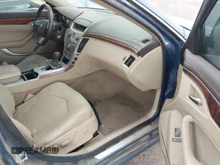 2009 Cadillac CTS RWD w/1SB with VIN 1G6DV57V690111847, listed as a IAAI auction lot 42189418 with 144,790 mi miles. Bid and sale history available at carsss.com. Image 5.
