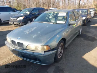 2001 BMW 5 Series 525iA with VIN WBADT43401GX23027, listed as a IAAI auction lot 41488393 with 200,960 mi miles. Bid and sale history available at carsss.com. Image 2.