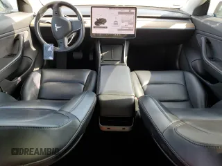 2019 Tesla Model 3 Mid Range with VIN 5YJ3E1EAXKF311719, listed as a Copart auction lot 44570825 with 143,034 mi miles and Salvage Title. Bid and sale history available at carsss.com. Image 8.