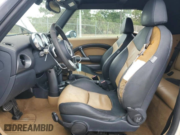 2006 MINI Convertible S with VIN WMWRH335X6TK57115, listed as a Copart auction lot 55756115 with 76,130 mi miles and Clean Title. Bid and sale history available at DreamBid. Image 7.
