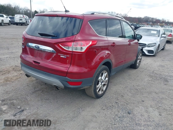2016 Ford Escape Titanium with VIN 1FMCU9JX2GUA89716, listed as a IAAI auction lot 41899786 with 85,474 mi miles and . Bid and sale history available at DreamBid. Image 4.