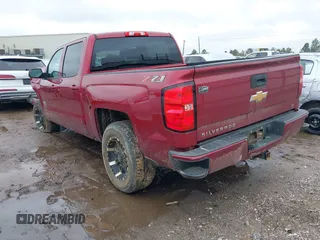 2018 Chevrolet Silverado 1500 LT with VIN 3GCUKREC5JG387905, listed as a IAAI auction lot 41392528 with 96,087 mi miles. Bid and sale history available at carsss.com. Image 3.