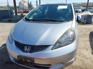 2013 Honda Fit with VIN JHMGE8H31DC042192, listed as a IAAI auction lot 42036582 with 63,223 mi miles. Bid and sale history available at carsss.com. Image 12.