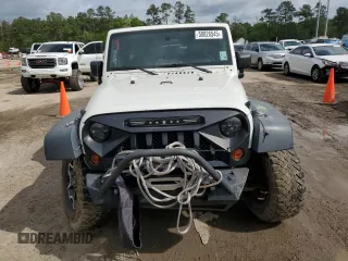 2008 Jeep Wrangler Rubicon z VIN 1J8GA69198L614736, wystawiony jako Copart lot #50826545 z przebiegiem 124 801 mil mil oraz Czysty tytuł • Clean title. Historia ofert i sprzedaży dostępna na DreamBid. Obrazek 5.