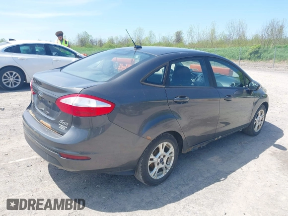 2015 Ford Fiesta SE with VIN 3FADP4BJ6FM160227, listed as a IAAI auction lot 42239191 with 131,614 mi miles and . Bid and sale history available at DreamBid. Image 4.