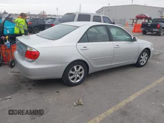 2005 Toyota Camry LE with VIN 4T1BF30K15U609930, listed as a IAAI auction lot 41321401 with 287,792 mi miles and . Bid and sale history available at DreamBid. Image 4.