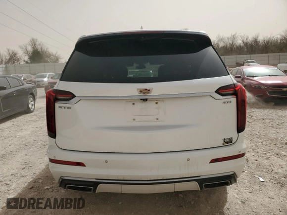 2020 Cadillac XT6 FWD Premium Luxury с VIN 1GYKPCRS3LZ108567, выставлен на аукционе Copart как лот 48582435 с пробегом 68 986 миль миль и Списание • Salvage title. История ставок и продаж доступна на DreamBid. Изображение 6.