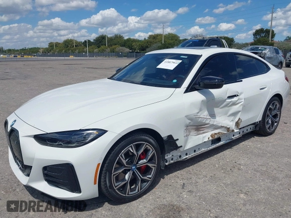 2024 BMW i4 eDrive35 z VIN WBY43AW02RFS79370, wystawiony jako IAAI lot #41887964 z przebiegiem 11 910 mil mil oraz . Historia ofert i sprzedaży dostępna na DreamBid. Obrazek 22.