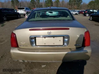 2005 Cadillac DeVille with VIN 1G6KD54Y65U167802, listed as a Copart auction lot 86577174 with 0 mi miles and Salvage Title. Bid and sale history available at carsss.com. Image 6.
