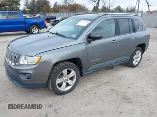 2011 Jeep Compass with VIN 1J4NF1FB1BD251618, listed as a IAAI auction lot 41633368 with 125,326 mi miles. Bid and sale history available at carsss.com. Image 2.
