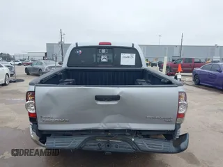 2009 Toyota Tacoma PreRunner with VIN 3TMJU62NX9M081748, listed as a IAAI auction lot 41608525 with 210,999 mi miles. Bid and sale history available at carsss.com. Image 16.