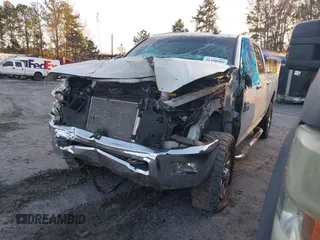 2016 Ram 2500 SLT with VIN 3C6UR5DL4GG141675, listed as a IAAI auction lot 41490099 with 116,467 mi miles. Bid and sale history available at carsss.com. Image 2.