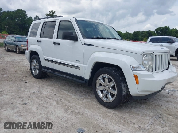 2012 Jeep Liberty Sport z VIN 1C4PJMAK0CW181346, wystawiony jako IAAI lot #42501898 z przebiegiem 173 614 mil mil oraz . Historia ofert i sprzedaży dostępna na DreamBid. Obrazek 1.
