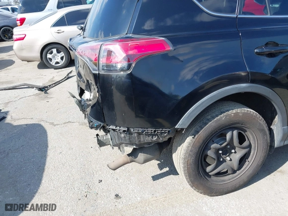 2018 Toyota RAV4 LE with VIN 2T3ZFREVXJW457751, listed as a IAAI auction lot 41529251 with 230,054 mi miles. Bid and sale history available at carsss.com. Image 18.