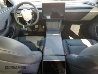 2025 Tesla Model 3 Long Range with VIN 5YJ3E1EA1SF878806, listed as a Copart auction lot 50427005 with 9,790 mi miles and Salvage Title. Bid and sale history available at DreamBid. Image 8.