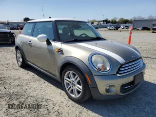 2011 MINI Hardtop with VIN WMWSU3C50BT182450, listed as a Copart auction lot 48638415 with 119,471 mi miles and Clean Title. Bid and sale history available at DreamBid. Image 4.