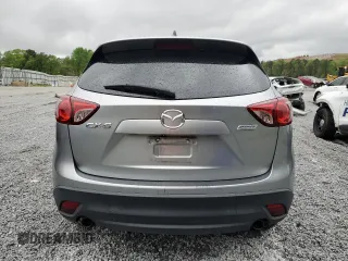 2013 Mazda CX-5 Touring with VIN JM3KE2CE1D0115023, listed as a Copart auction lot 52017905 with 174,254 mi miles and Clean Title. Bid and sale history available at carsss.com. Image 6.